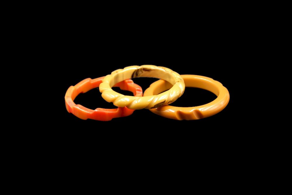 Appraisal: Bakelite Bracelets Faceted Caramel And Sunburst Bakelite Bracelets Faceted Caramel