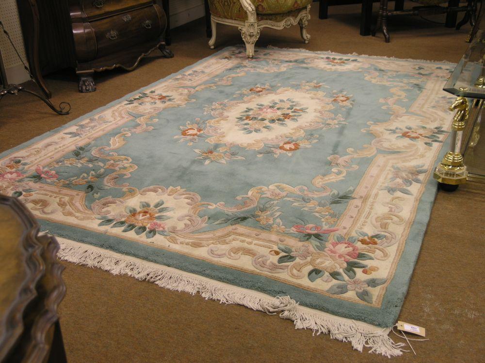 Appraisal: A good quality Chinese wool rug bright floral designs against