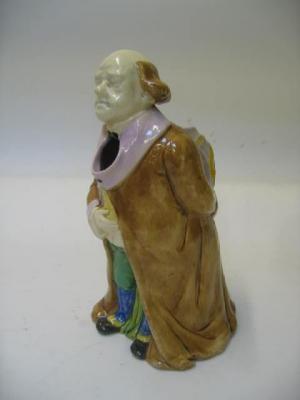 Appraisal: A MAJOLICA JUG late th century modelled as an elderly