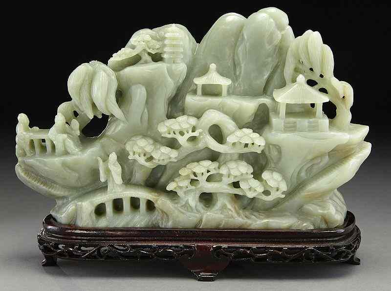 Appraisal: Chinese carved jade mountaindepicting figures in a landscape ''H x