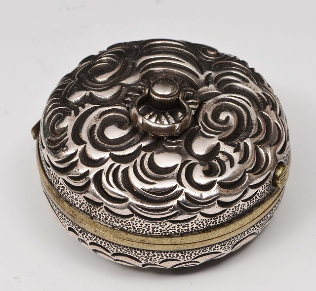 Appraisal: A Japanese silver and sentoku manju netsuke compassmid th Centurythe