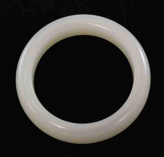 Appraisal: A Chinese celadon white jade bangle ins Estimate - Descriptions