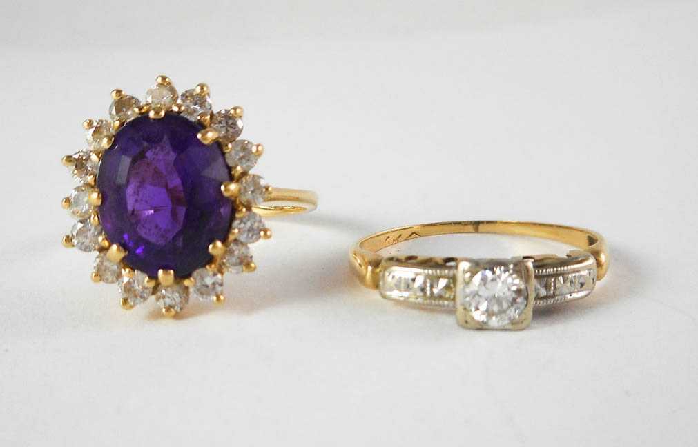 Appraisal: TWO DIAMOND AND FOURTEEN KARAT GOLD RINGS including a size