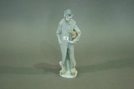 Appraisal: A Lladro figure of a man and violin