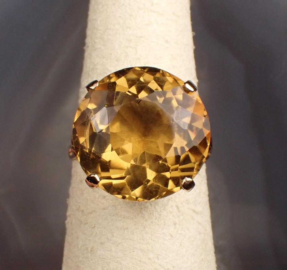 Appraisal: CITRINE AND FOURTEEN KARAT GOLD RING with four yellow gold