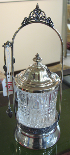 Appraisal: A VICTORIAN SILVERPLATED AND GLASS PICKLE CASTER by Racine Silverplate