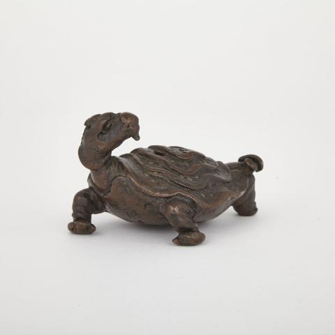 Appraisal: Bronze Tortoise In a dynamic pose with its head turned