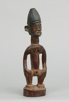 Appraisal: A Carved Wood Yoruba Figure of a Male A carved