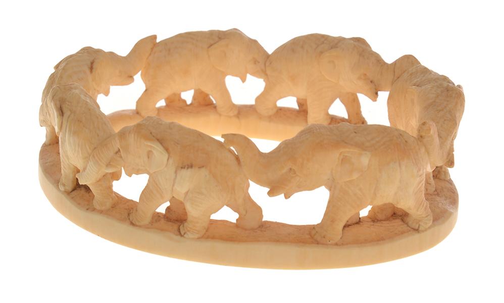 Appraisal: IVORY CARVED OVAL SURROUND OF ELEPHANTS