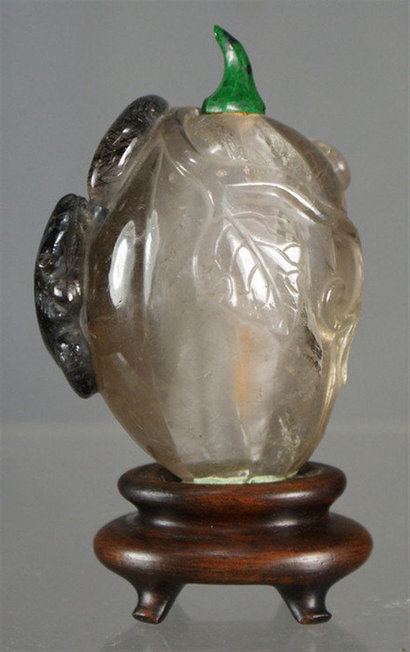 Appraisal: carved rock crystal figural snuff bottle dark hair crystals body