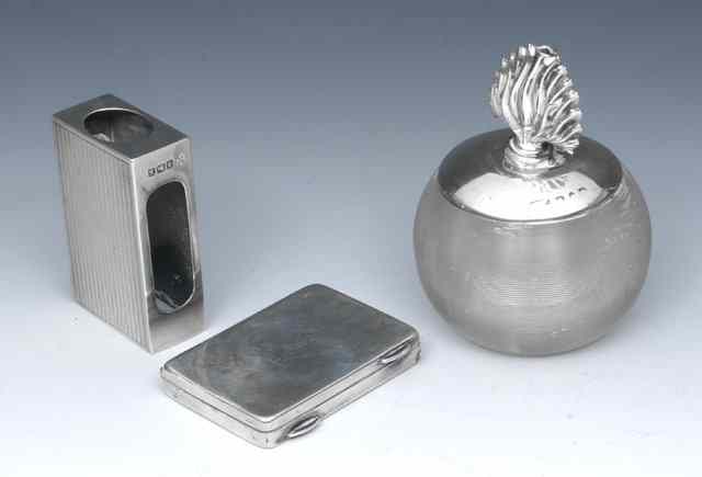 Appraisal: A SILVER MOUNTED TABLE LIGHTER in the form of a