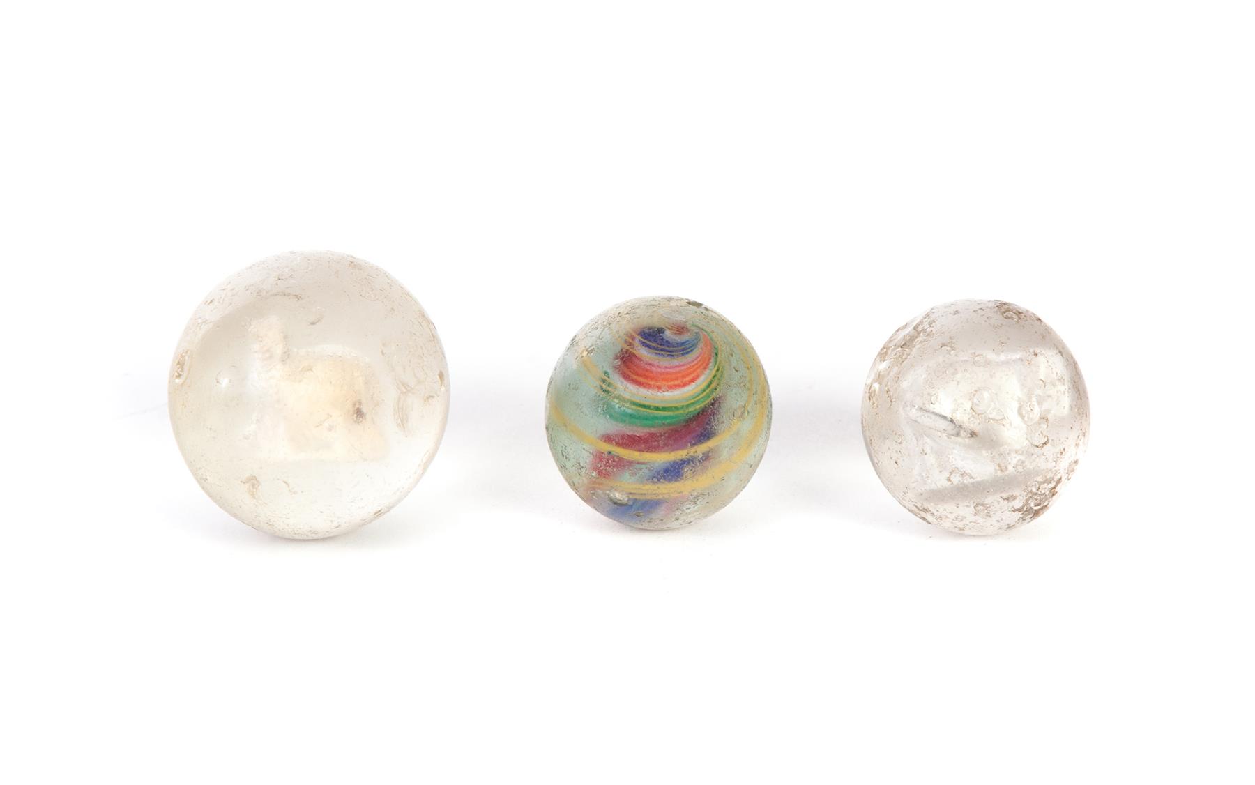 Appraisal: THREE GLASS MARBLES INCLUDING TWO SULFIDE American th century Sulfide