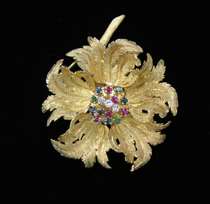 Appraisal: K Gold Flower Brooch K yellow gold textured finish with