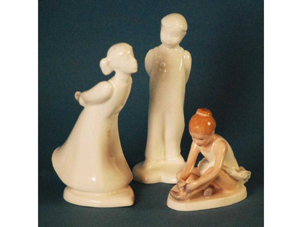 Appraisal: A PAIR OF ROYAL DOULTON WHITE GLAZED 'IMAGES' CHINA FIGURES