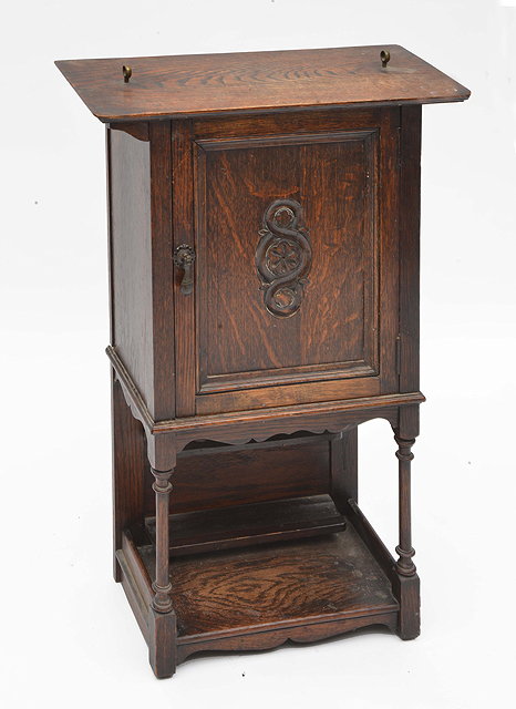 Appraisal: A SMALL OAK TABLE TOP SMOKERS CABINET with guilloche decoration