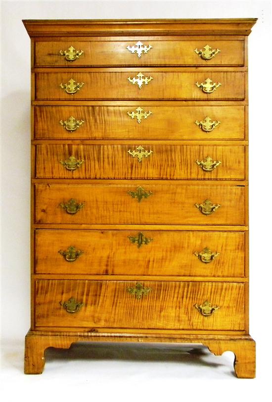 Appraisal: th th C figured maple tall chest seven graduated drawers