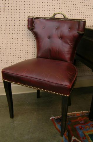 Appraisal: Pair of vintage leather side chairs worn burgundy leather upholstery