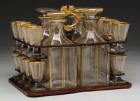 Appraisal: DECANTER SET Decanter set consists of four clear glass decanters