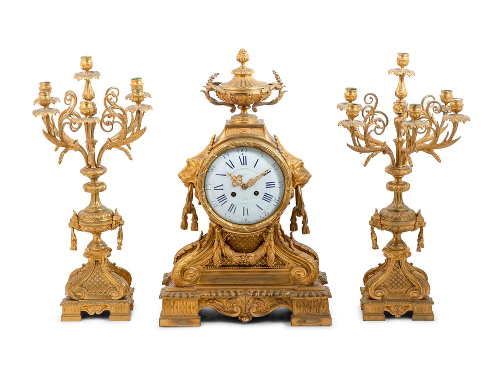 Appraisal: A Napoleon III Gilt Bronze Clock Garniture A Napoleon III