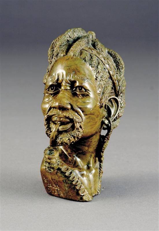 Appraisal: Caleb Mhere African th century NUBIAN MANcarved verdite signed Caleb