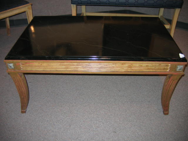 Appraisal: CLASSICAL DESIGN LOW TABLE black wood top on fluted splayed