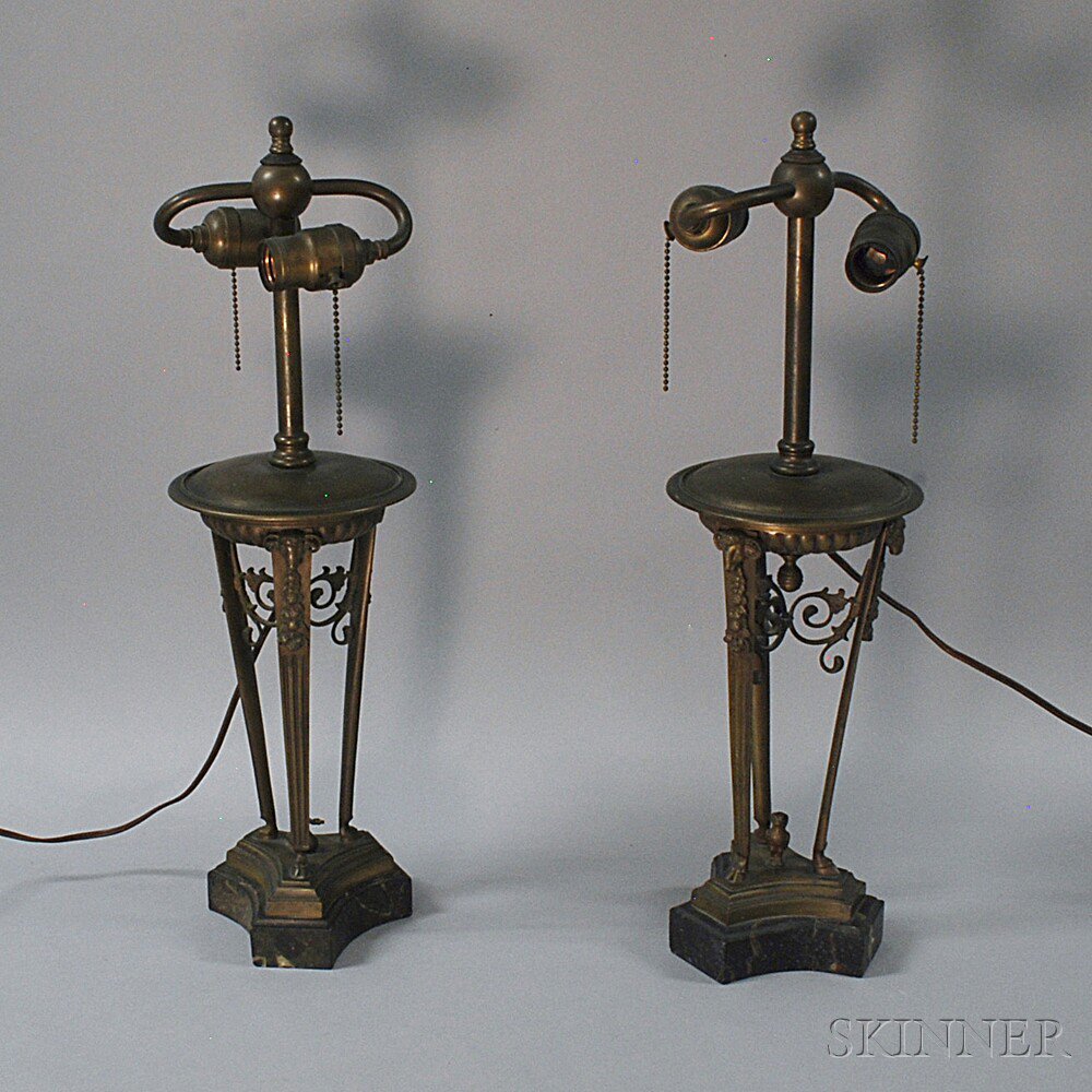 Appraisal: Pair of Neoclassical-style Cast Metal Lamps the lobed bowl on