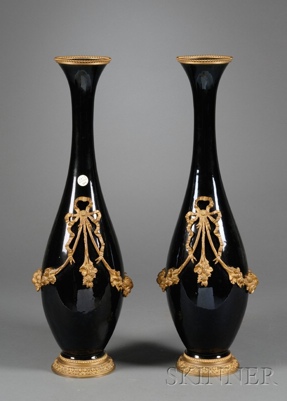 Appraisal: Pair of Gilt Bronze Mounted Porcelain Vases France th century