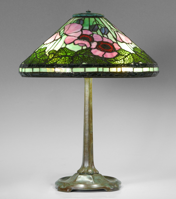 Appraisal: TIFFANY STYLE SIGNED LEADED GLASS LAMP Unmarked patinated bronze base