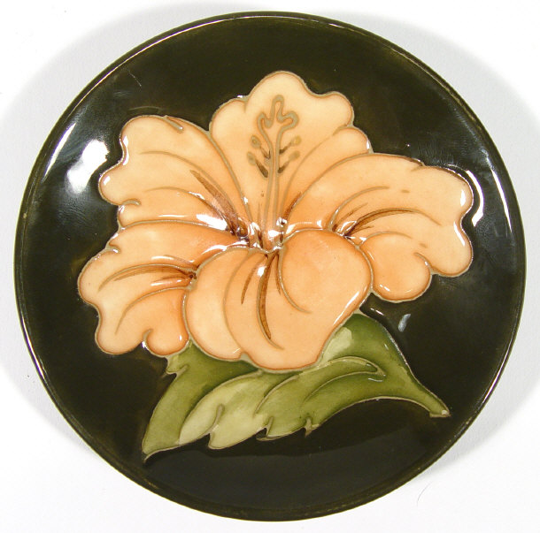 Appraisal: Moorcroft pottery dish hand painted and tubelined with coral hibiscus