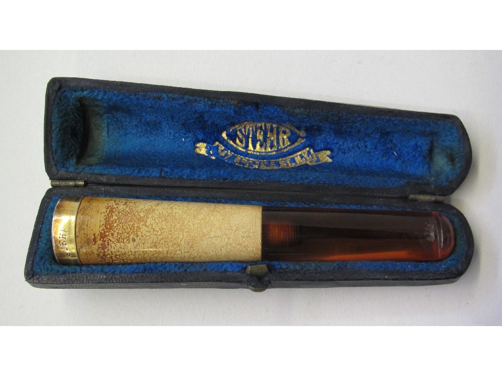 Appraisal: Cased amber and gilt metal cigar holder