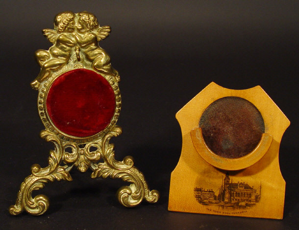 Appraisal: Two pocket watch stands one Mauchlin printed with the 'Town