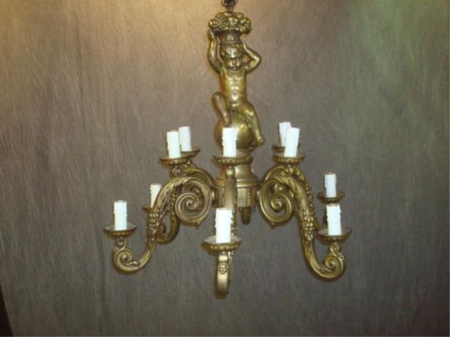 Appraisal: Bronze or brass large chandelier w putti Multi arm with