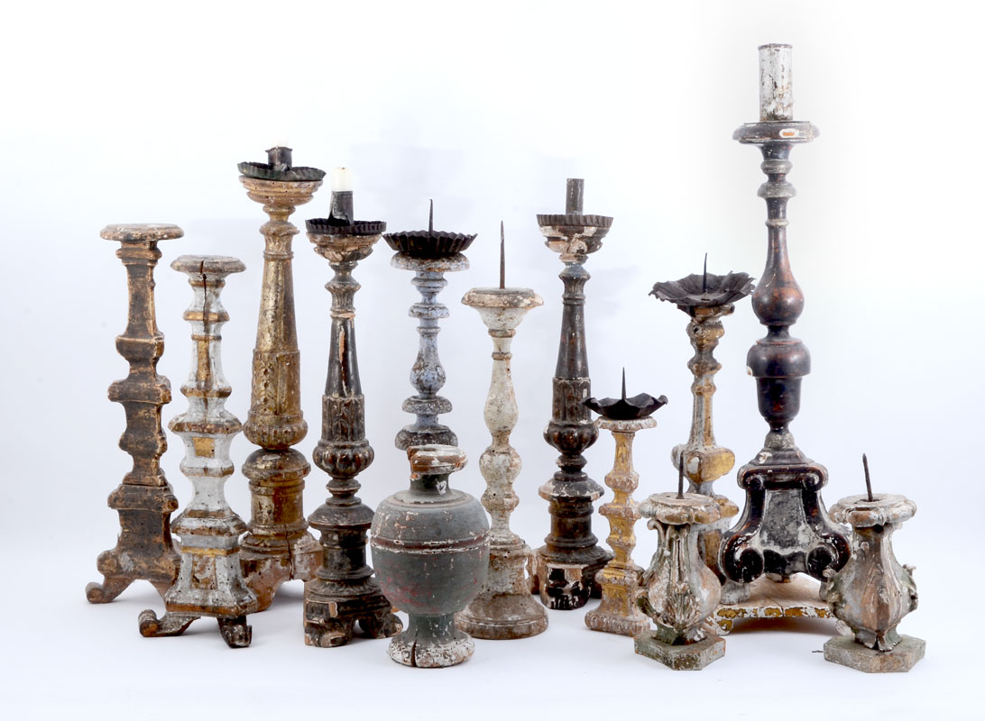 Appraisal: COLLECTION OF CARVED WOOD CANDLESTICKS assorted candlesticks likely Continental most