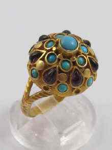 Appraisal: A yellow metal tests ct gold bombe ring set with