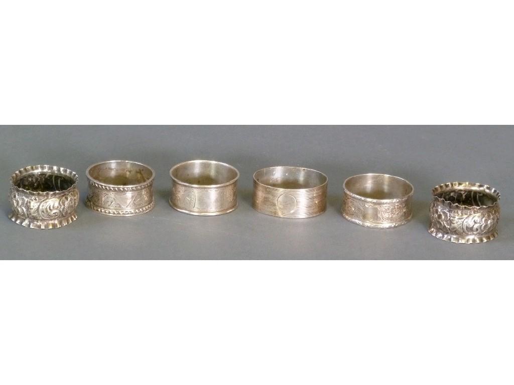 Appraisal: SIX EDWARD VII AND LATER SILVER NAPKIN RINGS comprising TWO