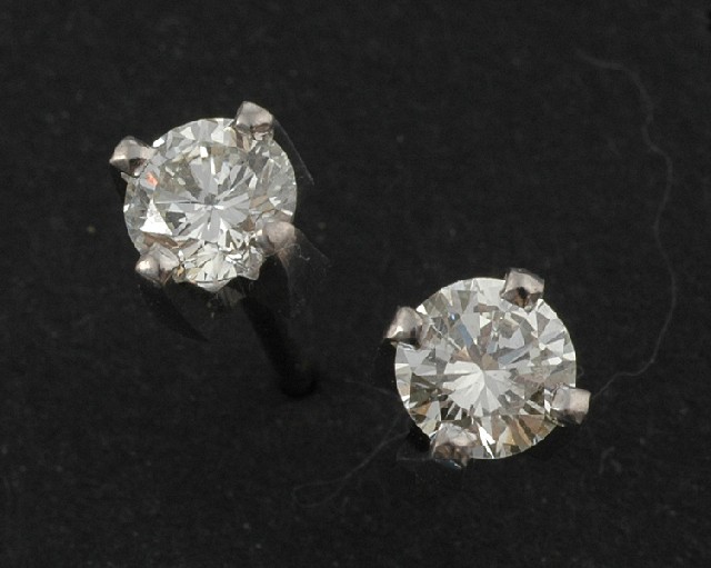 Appraisal: A pair of diamond stud earrings Each brilliant cut diamond