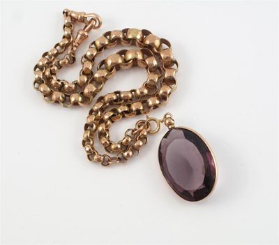 Appraisal: An amethyst coloured paste pendant and ct gold chain