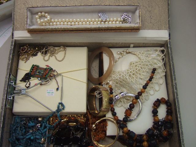 Appraisal: A collection of costume jewellery including pendant necklaces bracelets bangles