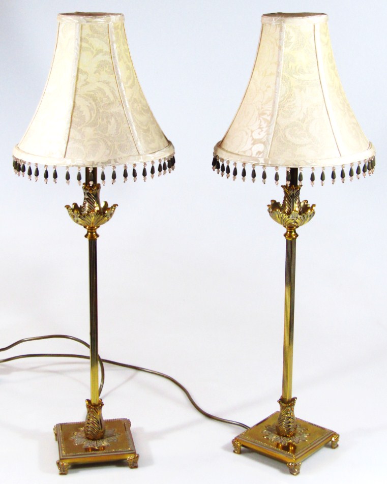 Appraisal: A pair of modern brass table lamps each with acanthus