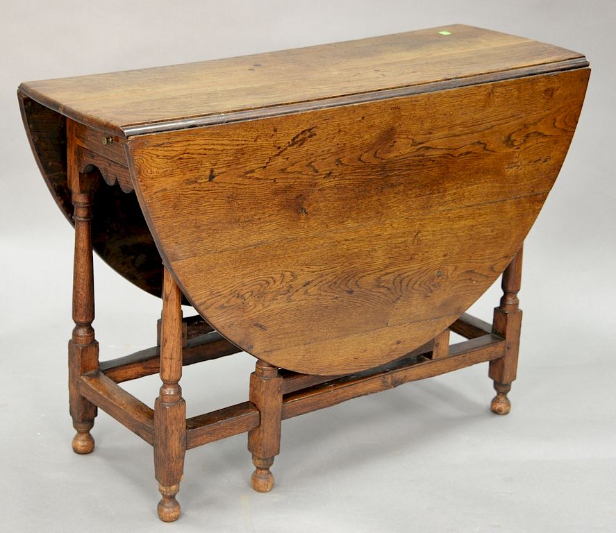 Appraisal: William and Mary oak gateleg oval one drawer table with