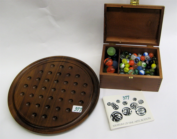 Appraisal: HARDWOOD BOX OF MARBLES AND GAME BOARD The box filled