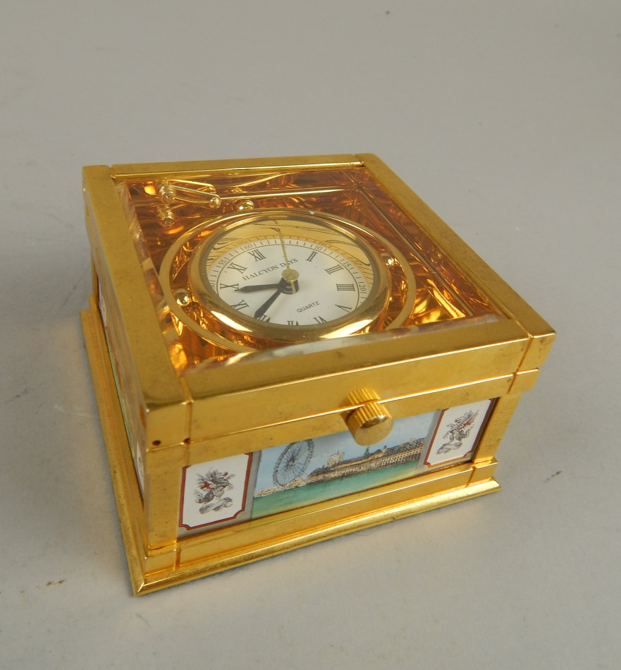 Appraisal: A modern Halcyon Days Quartz travel clock with cm diameter