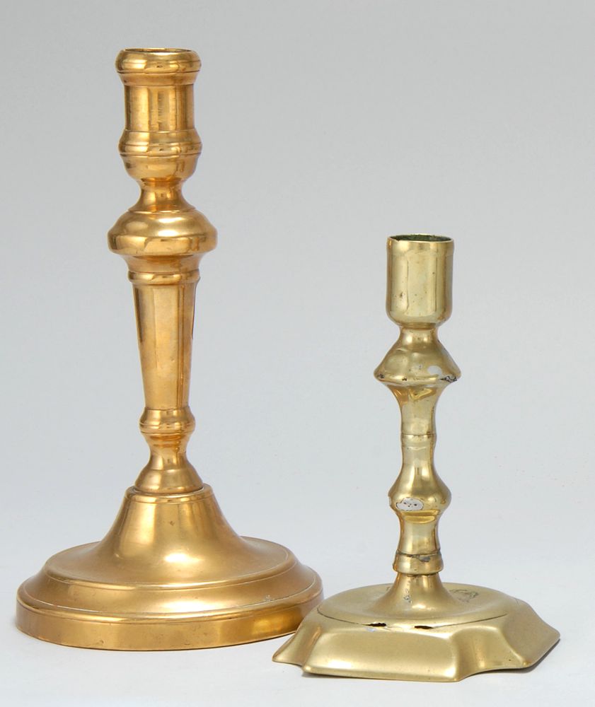 Appraisal: TWO CANDLESTICKS One th century Queen Anne brass height and