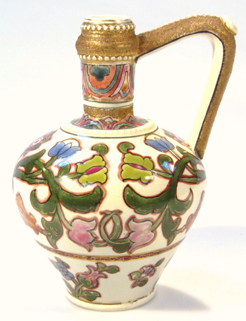 Appraisal: A late thC Budapest Art Nouveau pottery jug the bellied