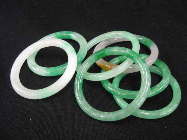 Appraisal: Jade Bangle Bracelets estate mixture '' to - '' openings