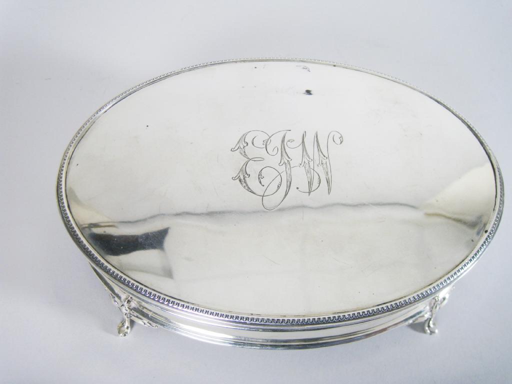 Appraisal: A George V large oval Jewel Casket with beaded rim