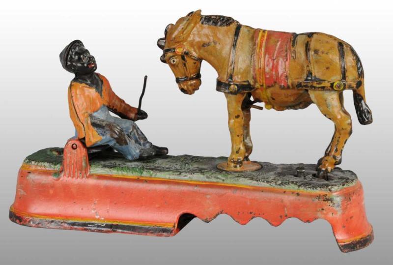 Appraisal: Cast Iron Always Did 'Spise a Mule Mechanical Bank Description