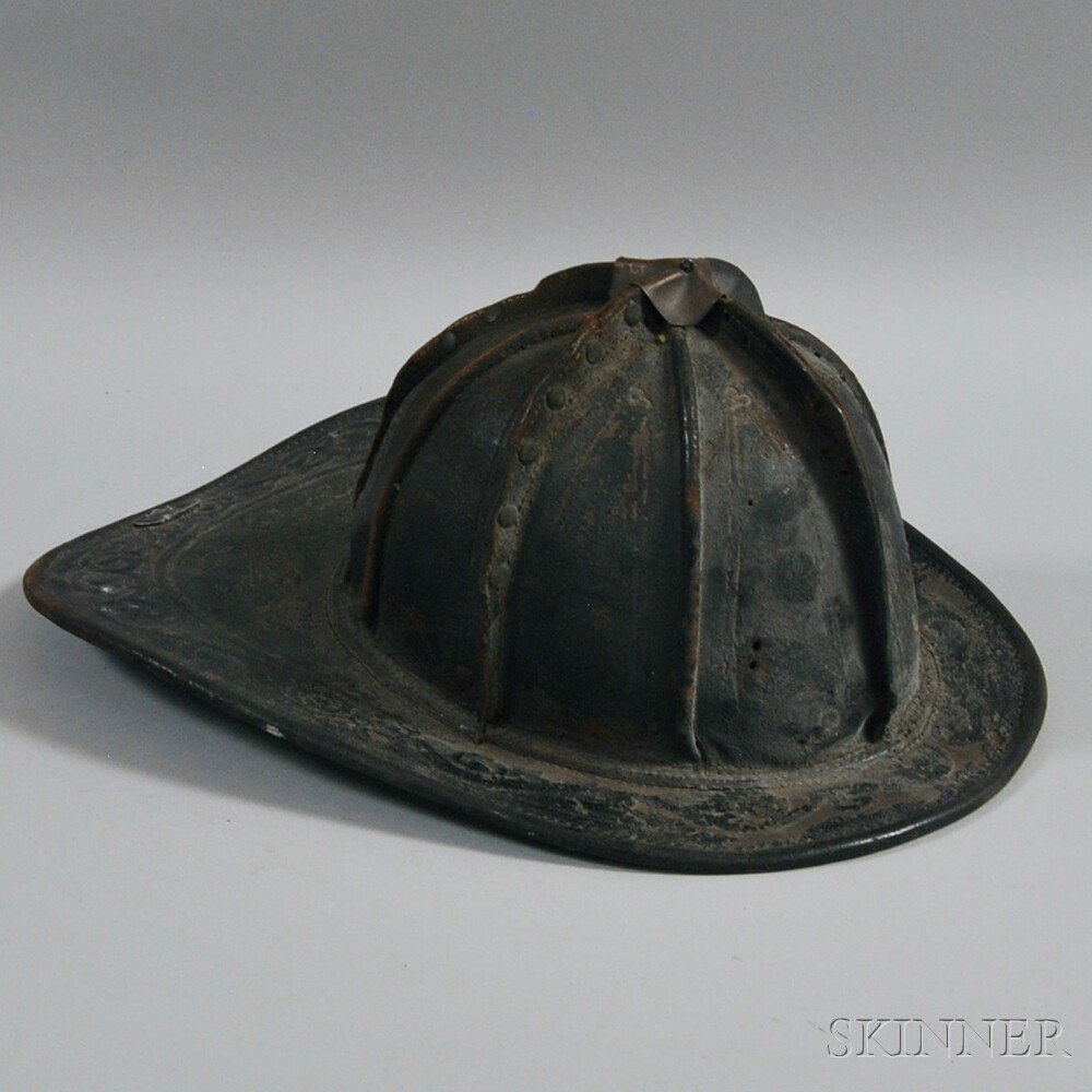 Appraisal: Leather Fire Helmet with wool lining and foliate-embossed rim ht