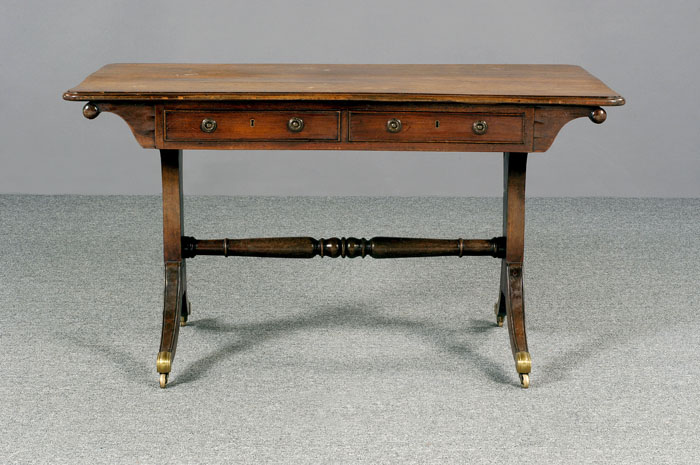 Appraisal: REGENCY MAHOGANY SOFA TABLE The rectangular top with rounded corners