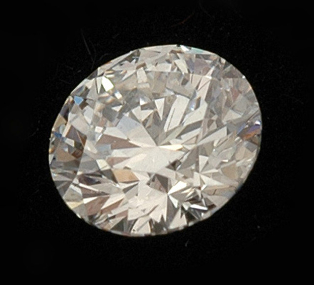 Appraisal: A loose diamond The round brillant cut diamond weighing cts